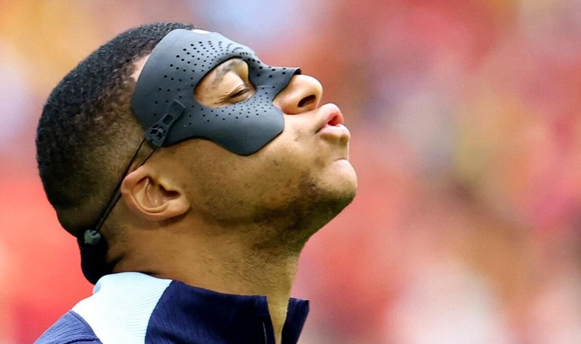 Why is Kylian Mbappe wearing a black mask